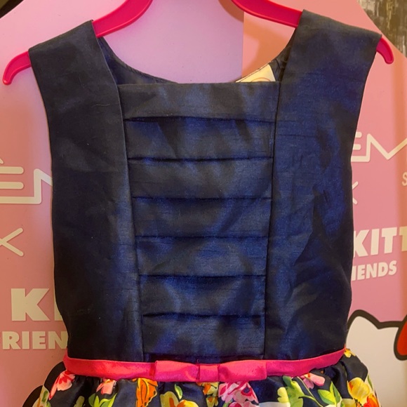 Blue dress with flower pattern on the skirt. - Picture 2 of 8